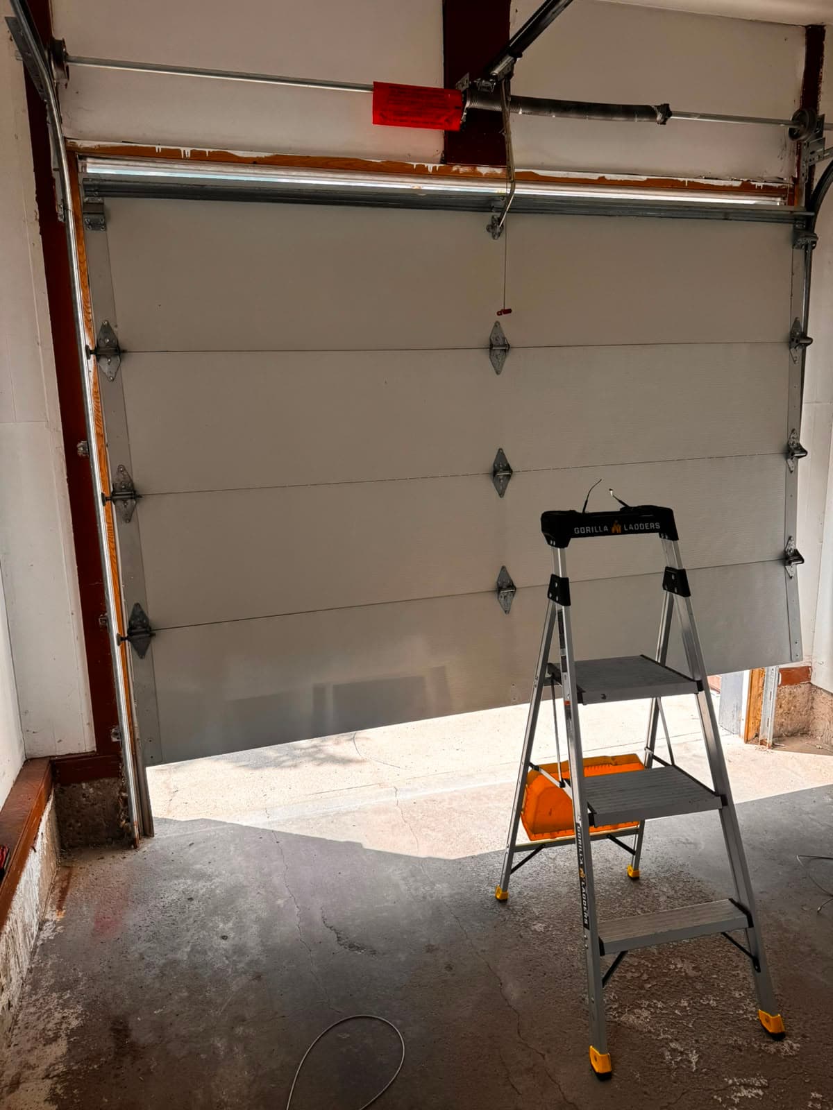 Garage door repair work on a residential property